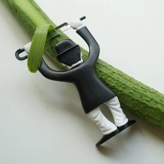 Chaplin-Inspired Creative Peeler – Stylish Fruit & Vegetable Cutter